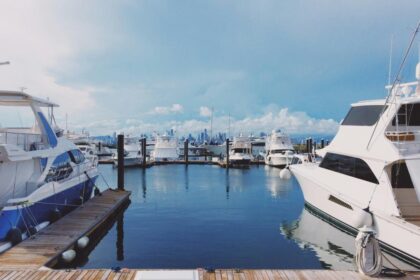 white boat on dock during daytime